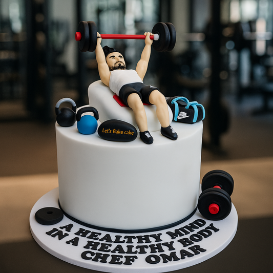 A white gym-themed birthday cake with a 3D man figurine bench pressing, edible kettlebells, and dumbbells by Let's Bake Cake Abu Dhabi.