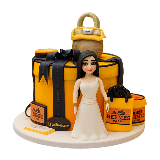 A luxury Hermes-themed birthday cake with edible shopping bags, a Birkin bag, and a custom lady figurine by Let's Bake Cake Abu Dhabi.