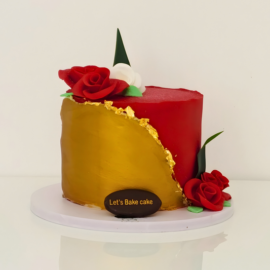 A luxury red and gold fault line cake decorated with edible gold leaf and handcrafted red roses by Let's Bake Cake Abu Dhabi.