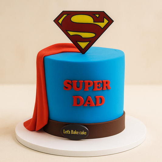A luxury Superman-themed birthday cake with 'Super Dad' lettering and a red fondant cape by Let's Bake Cake Abu Dhabi.