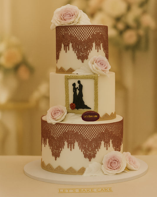 A luxury three-tier white wedding cake with rose gold lace, pink roses, and a couple's silhouette in a gold frame by Let's Bake Cake Abu Dhabi
