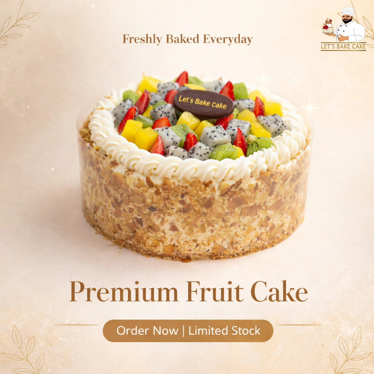 A luxury fresh fruit cake topped with dragon fruit, mango, kiwi, and strawberries, featuring a nutty crust and whipped cream border, by Let's Bake Cake Abu Dhabi